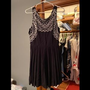 Black dress with white details